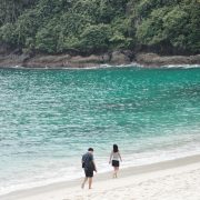guide following client at teluk hijau